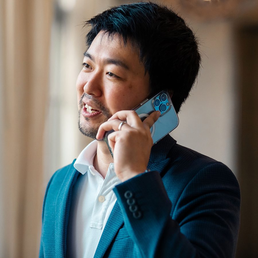 Asian man on cellphone