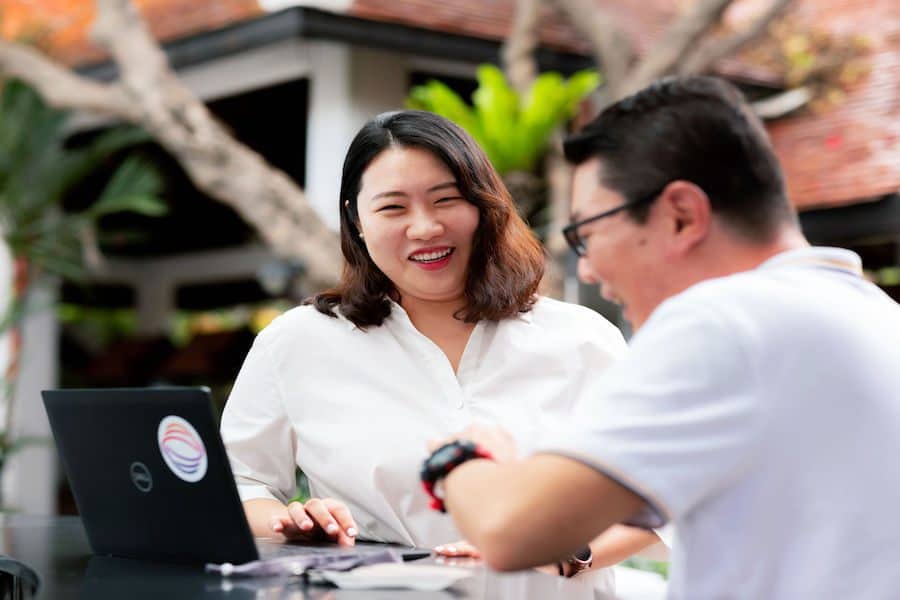 man and woman talking and smiling