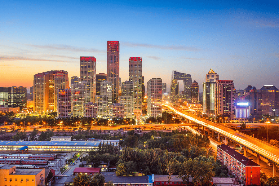 Beijing, China central business district skyline at sunset