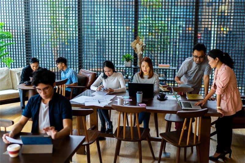 employees in Malaysia working in an office