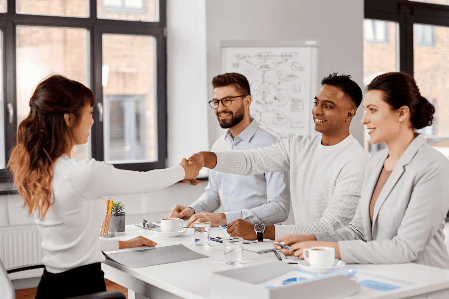 Human Resource team in a Tech startup talking to a recruitee during the hiring process