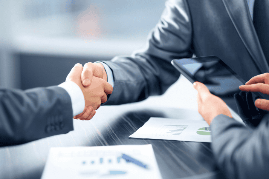 two people shaking hands