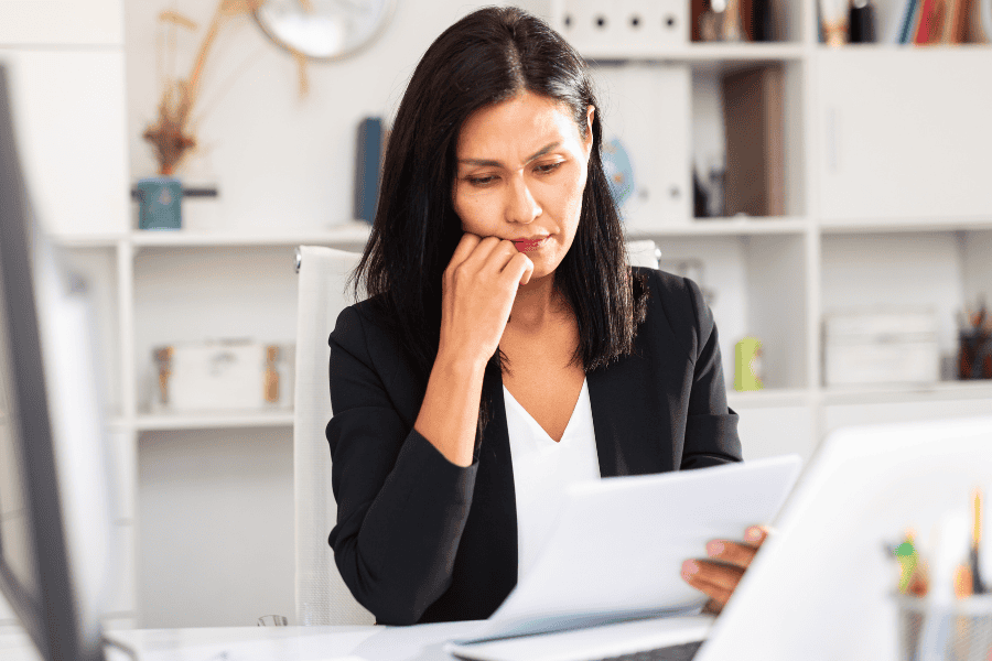 a professional reviewing a document