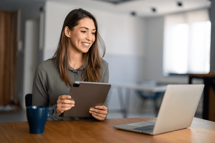 A professional woman discusses redundancy strategies during a video conference.