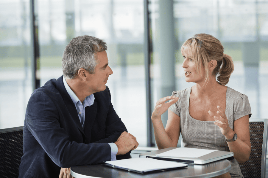 two colleagues discussing shelf companies
